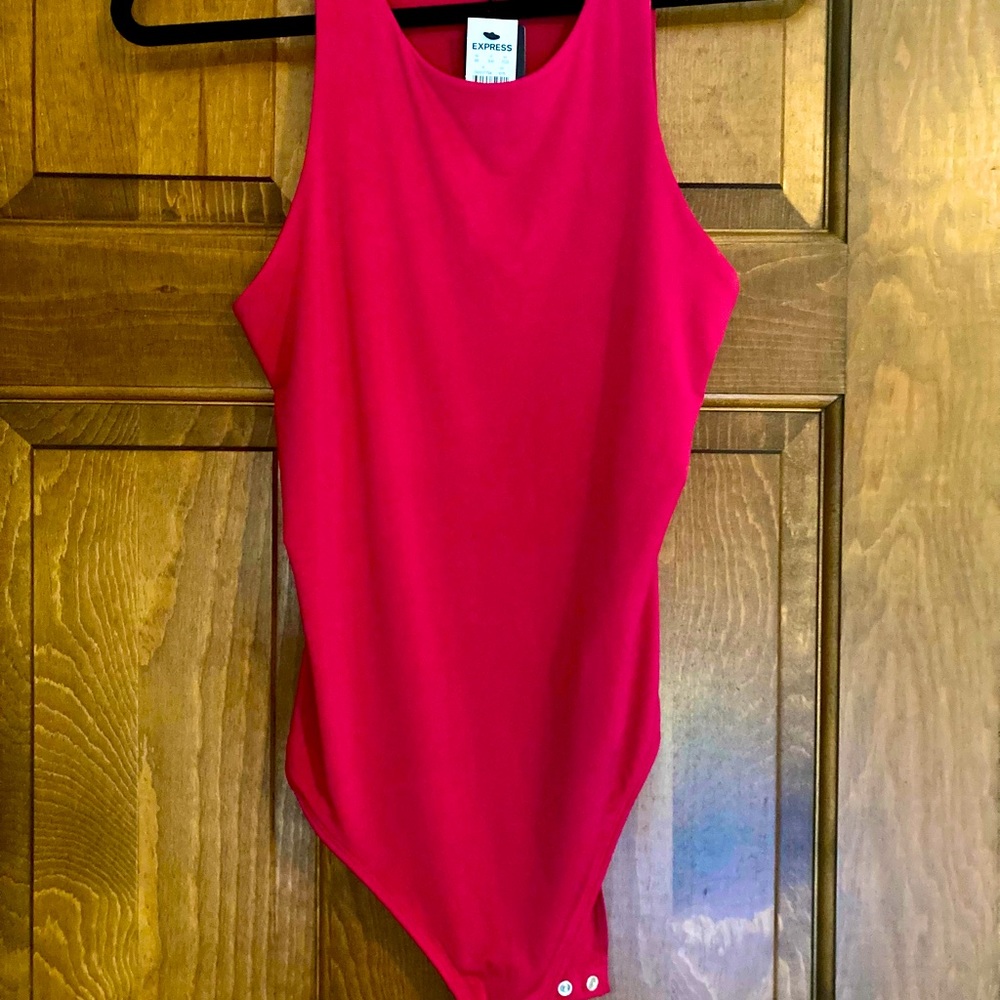 Express bodysuit new with tags, never worn. Smoke free, pet free home.